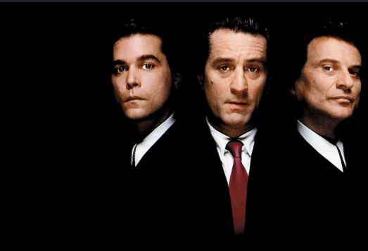 Goodfellas 1990 featured image and movie poster showing Henry Hill, Jimmy Conway, and Tommy DeVito under moody low key lighting setup