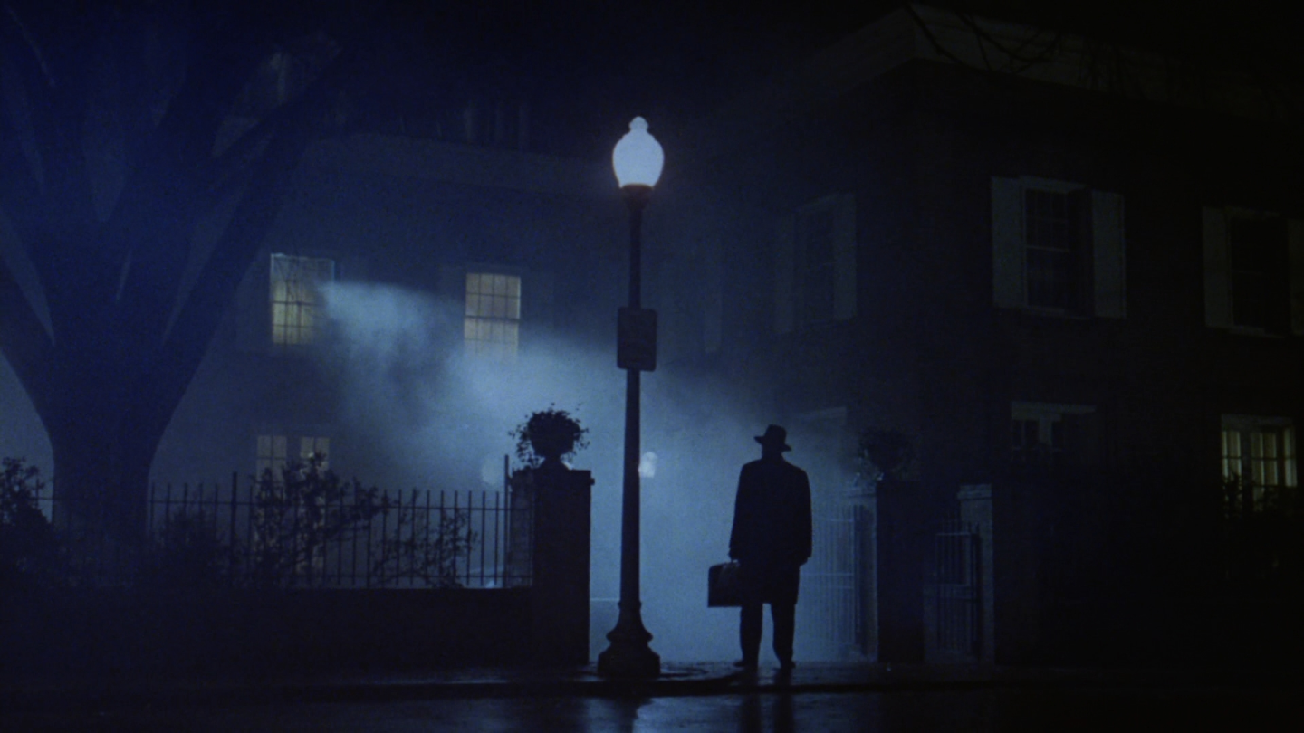 The Exorcist 1973 Father Merrin Arrival Streetlamp Silhouette High Contrast Chiaroscuro Cinematography Owen Roizman